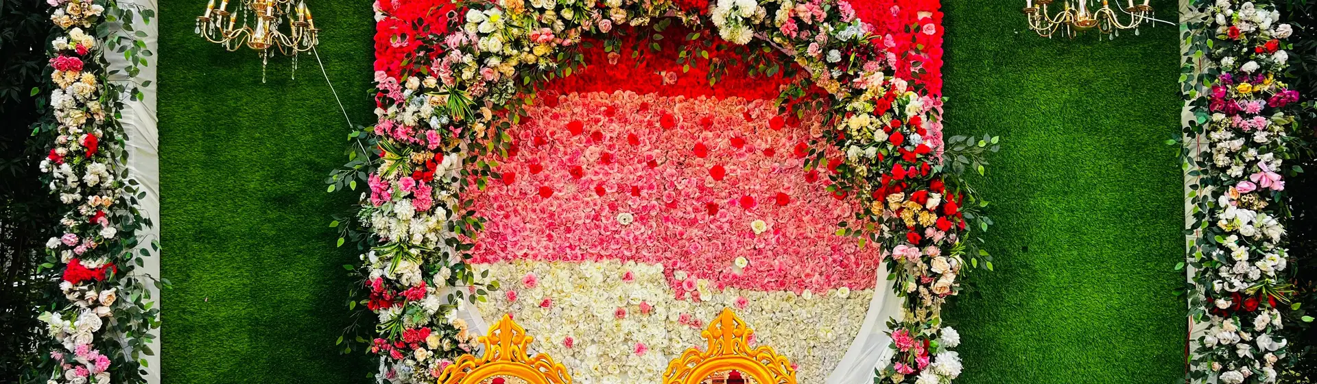 Floral wedding stage backdrop created by EventsMate